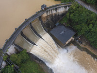 An aerial photo is showing the flood discharge at the Yongli Hydropower Station in Congjiang County, Southwest China's Guizhou Province, on...