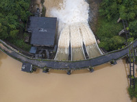 An aerial photo is showing the flood discharge at the Yongli Hydropower Station in Congjiang County, Southwest China's Guizhou Province, on...