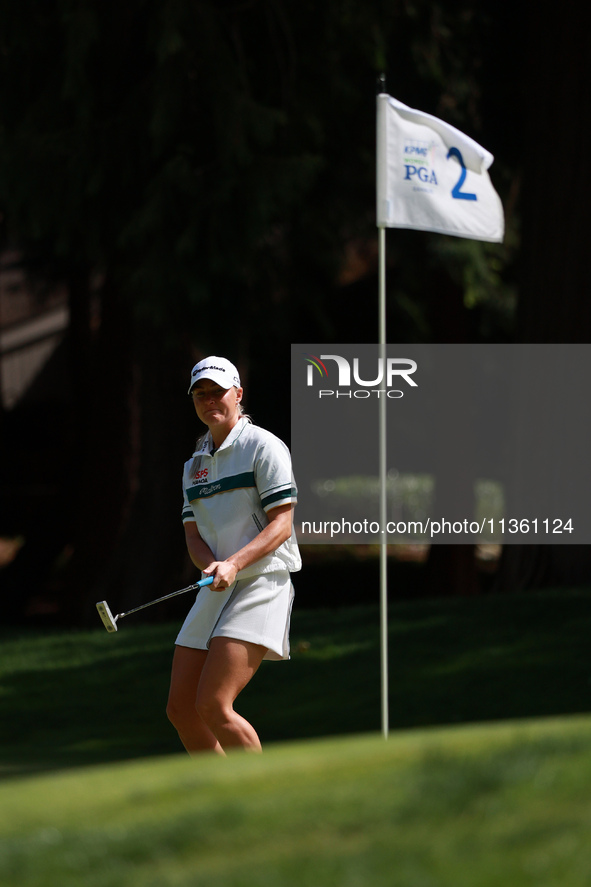 Charley Hull of England reacts to her putt on the second green during Day Four of the KPMG Women's PGA Championship at Sahalee Country Club...