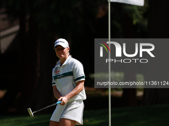 Charley Hull of England reacts to her putt on the second green during Day Four of the KPMG Women's PGA Championship at Sahalee Country Club...