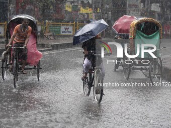 After days of intense heat, Dhaka city witnessed heavy rain and thunderstorms during the monsoon season on Wednesday, June 26, 2024. (