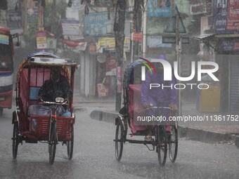 After days of intense heat, Dhaka city witnessed heavy rain and thunderstorms during the monsoon season on Wednesday, June 26, 2024. (