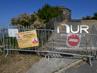 PORT-EN-BESSIN-HUPPAIN, FRANCE - JUNE 25: 
Access to Tour Vauban, a historic landmark in Port-en-Bessin-Huppain, blocked due to unstable cli...