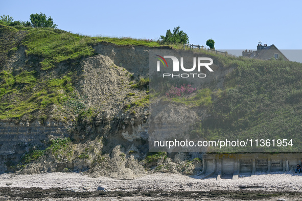 PORT-EN-BESSIN-HUPPAIN, FRANCE - JUNE 25: 
General view of the coastline at Port-en-Bessin, with cliffs subject to active erosion: landslide...