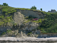 PORT-EN-BESSIN-HUPPAIN, FRANCE - JUNE 25: 
General view of the coastline at Port-en-Bessin, with cliffs subject to active erosion: landslide...