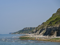 PORT-EN-BESSIN-HUPPAIN, FRANCE - JUNE 25: 
General view of the coastline at Port-en-Bessin, with cliffs subject to active erosion: landslide...