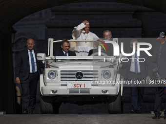 Pope Francis is arriving on the popemobile for the weekly general audience in The Vatican, on June 26, 2024, at St Peter's Square. (