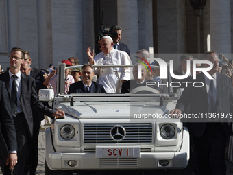 Pope Francis is arriving on the popemobile for the weekly general audience in The Vatican, on June 26, 2024, at St Peter's Square. (