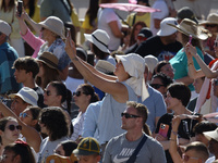 People are taking photos during Pope Francis' weekly general audience in The Vatican, on June 26, 2024, at St. Peter's Square. (