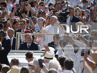 Pope Francis is arriving for his weekly general audience in St. Peter's Square at the Vatican, on June 26, 2024. (