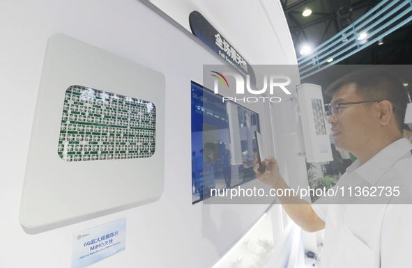 Visitors are viewing a 6G Very Large Array MIMO antenna at the 2024 Mobile World Congress (MWC Shanghai) in Shanghai, China, on June 26, 202...