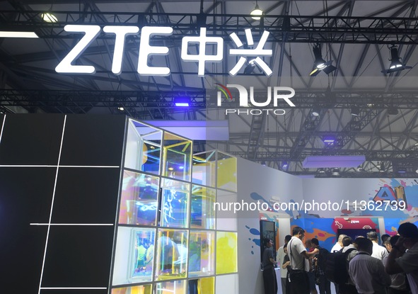 Visitors are visiting the launch of ZTE's AI communication technology at the 2024 Mobile World Congress (MWC Shanghai) in Shanghai, China, o...