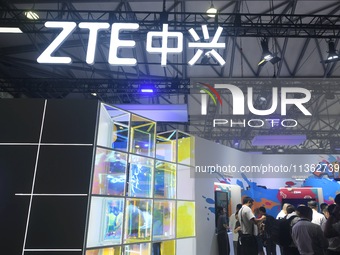 Visitors are visiting the launch of ZTE's AI communication technology at the 2024 Mobile World Congress (MWC Shanghai) in Shanghai, China, o...