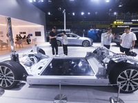 Visitors are visiting the NIO smart car chassis at the 2024 Mobile World Congress (MWC Shanghai) in Shanghai, China, on June 26, 2024. (