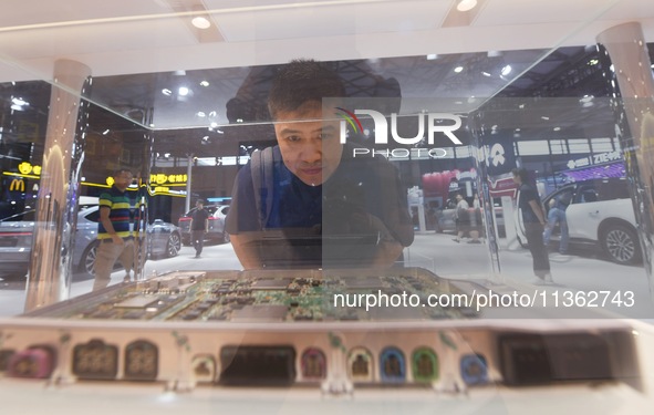 Visitors are visiting NIO's central computing platform featuring Nvidia's car-scale chips at the 2024 Mobile World Congress (MWC Shanghai) i...