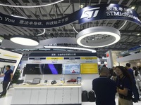 Foreign visitors are visiting the booth of STMicroelectronics at the 2024 Mobile World Congress (MWC Shanghai) in Shanghai, China, on June 2...