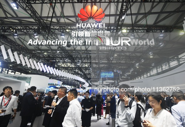 Foreign visitors are visiting Huawei's stand at the 2024 Mobile World Congress (MWC Shanghai) in Shanghai, China, on June 26, 2024. 