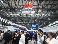 Foreign visitors are visiting Huawei's stand at the 2024 Mobile World Congress (MWC Shanghai) in Shanghai, China, on June 26, 2024. (