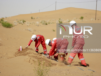 Workers are carrying out a special inspection of equipment in the gas pipeline network that crosses the Yellow River and deserts in Zhongwei...