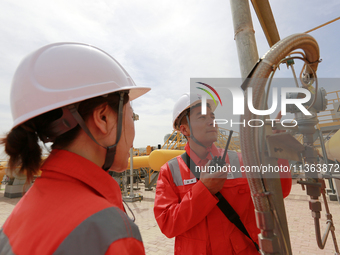 Workers are carrying out a special inspection of equipment in the gas pipeline network that crosses the Yellow River and deserts in Zhongwei...