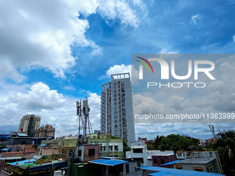 Cotton candy clouds are appearing before monsoon rain, above the cityscape of Kolkata, India, on June 27, 2024 (