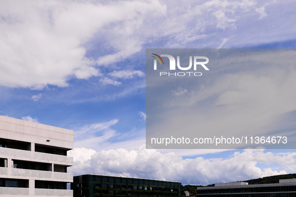 Storm clouds are beginning to form on the horizon, announcing the imminent arrival of a storm in Zurich, Switzerland, on June 27, 2024. 