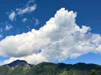 Storm clouds are beginning to form on the horizon, announcing the imminent arrival of a storm in Zurich, Switzerland, on June 27, 2024. (