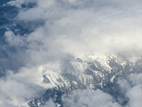 Clouds are appearing on the horizon, viewed from the window of an Airbus A321 from Vueling Airlines in Zurich, Switzerland, on June 27, 2024...