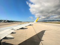 Clouds are appearing on the horizon, viewed from the window of an Airbus A321 from Vueling Airlines in Zurich, Switzerland, on June 27, 2024...