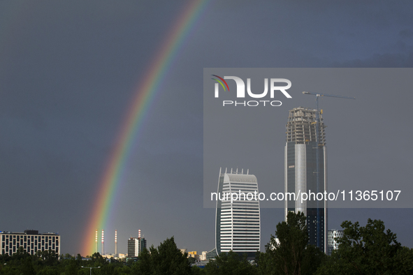 A rainbow is appearing over the eastern part of Sofia, Bulgaria, on June 27, 2024. 