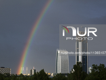 A rainbow is appearing over the eastern part of Sofia, Bulgaria, on June 27, 2024. (