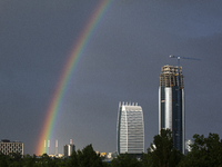 A rainbow is appearing over the eastern part of Sofia, Bulgaria, on June 27, 2024. (