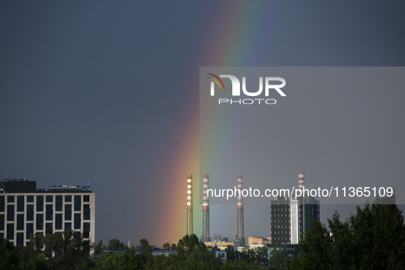 A rainbow is appearing over the eastern part of Sofia, Bulgaria, on June 27, 2024. 