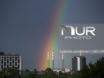 A rainbow is appearing over the eastern part of Sofia, Bulgaria, on June 27, 2024. (