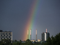 A rainbow is appearing over the eastern part of Sofia, Bulgaria, on June 27, 2024. (