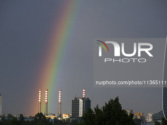 A rainbow is appearing over the eastern part of Sofia, Bulgaria, on June 27, 2024. (