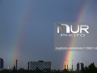 A rainbow is appearing over the eastern part of Sofia, Bulgaria, on June 27, 2024. (