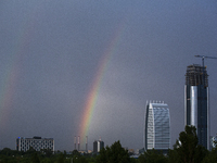 A rainbow is appearing over the eastern part of Sofia, Bulgaria, on June 27, 2024. (