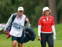 Amy Yang of Republic of Korea walks with her caddie to the 18th green during the final round of the KPMG Women's PGA Championship at Sahalee...