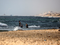 A ship is being pictured off the coast of Gaza near a temporary floating pier anchored by the United States to boost aid deliveries, as seen...