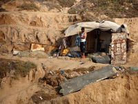 Palestinians are gathering on the beach in Nuseirat in the central Gaza Strip on June 27, 2024, amid ongoing cross-border tensions as fighti...