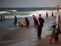 A ship is being pictured off the coast of Gaza near a temporary floating pier anchored by the United States to boost aid deliveries, as seen...