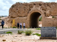 Workers are carrying out site investigation and data collection at the ancient city section of Xiakou in Zhangye, China, on June 27, 2024. I...