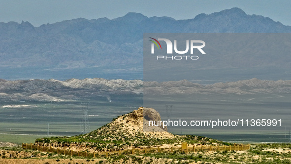 A photo is showing the ancient ruins of Jinshanzi Beacon Tower of the Great Wall in Zhangye, China, on June 27, 2024. In recent years, Shand...