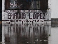 A fence is being seen submerged after the heavy rains that are hitting Mexico. Vicente Villada Avenue in the Municipality of Nezahualcoyotl...