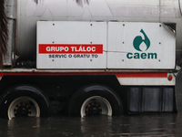 A dewatering truck is draining the water after the heavy rains that hit Mexico. Vicente Villada Avenue in the Municipality of Nezahualcoyotl...