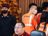 Indonesian immigration authorities are showing a group of detained Taiwan nationals during a press conference at the Immigration Detention H...