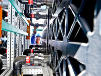 Technicians are checking the installation of energy storage equipment at the construction site of Energy Technology's 250MW/1000MWh independ...