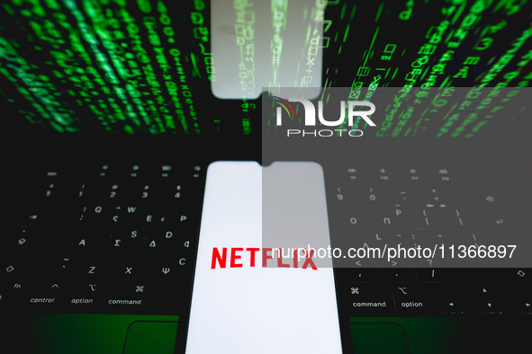 The Netflix logo is being displayed on a smartphone screen in Athens, Greece, on June 28, 2024. (Photo Illustration by Nikolas Kokovlis/NurP...