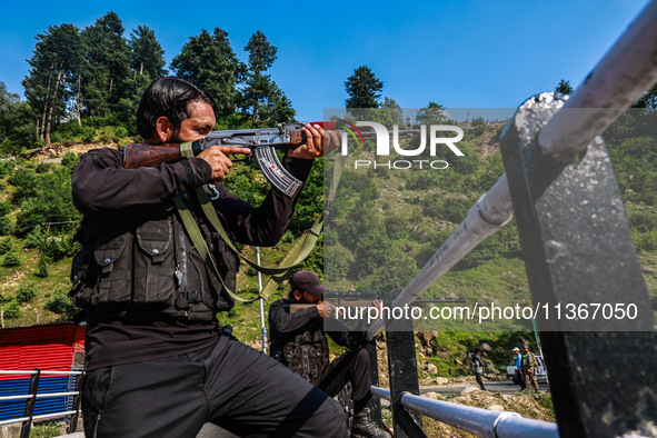 Security forces are standing alert as Amarnath Yatra is beginning in Jammu and Kashmir, India, on June 28, 2024. 